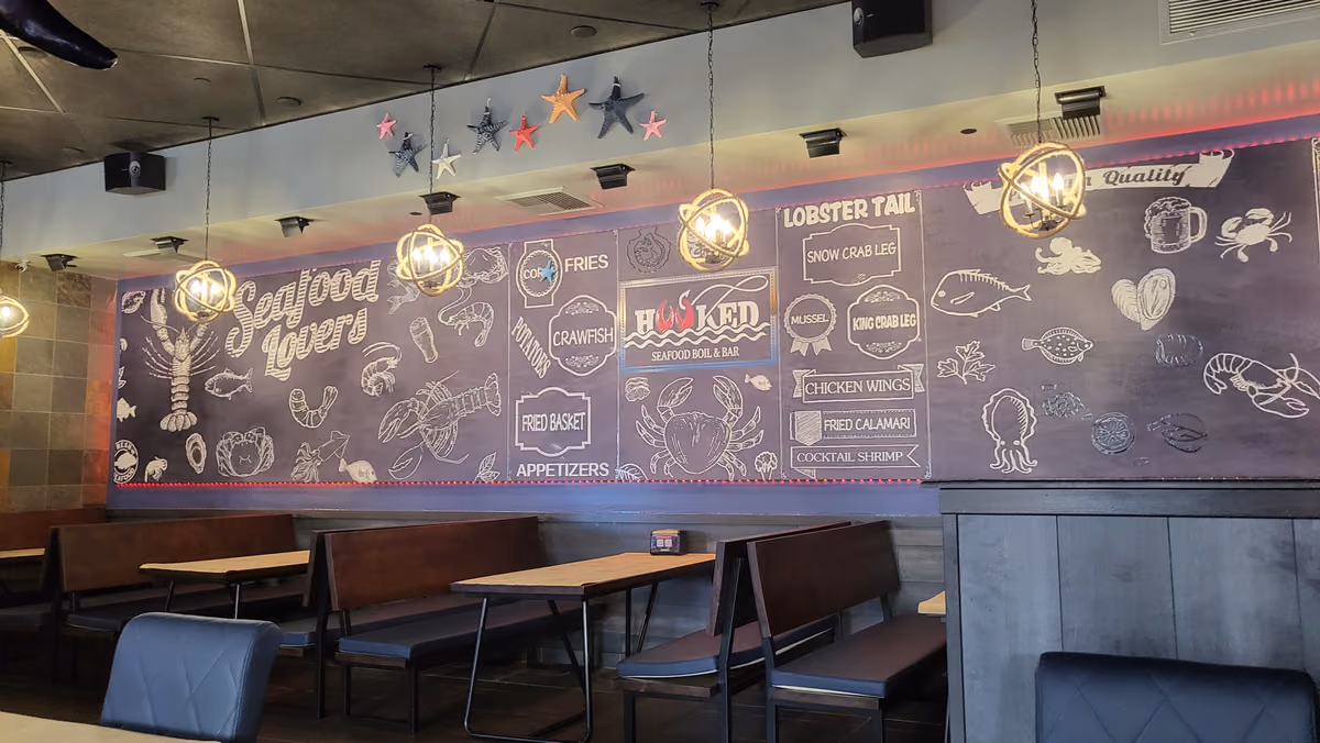 The Seafood Lovers chalk wall in the dining room